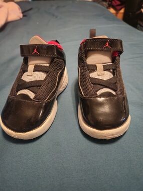 Jordan Kids Black and White Sneakers with Red Logo